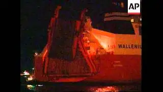 Norwegian refugee ship docks in Singapore to unload cargo.