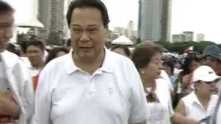 Ex-CJ Corona heckled at anti-pork protest