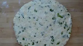 Delicious flatbread with cheese and herbs