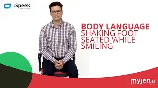 Body Language - Shaking Foot Seated while Smiling