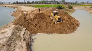 Nice Project Build Road Along the Canal Use Top Level Operator Bulldozer and Truck Is Actively Work