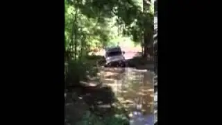 Nice jeep TJ going through some mud