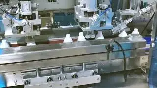 Liquid bottling line tracking type filler screw capper sleeve labeller