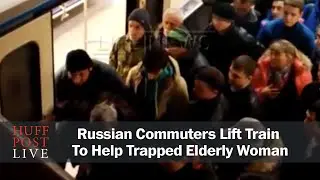 Russian Commuters Lift Train To Help Trapped Elderly Woman