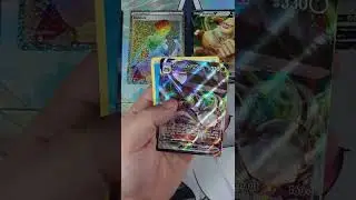 Peeling a Secret Ditto and finding a VMAX in the same pack of Pok&eacute;mon GO!
