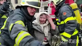 Ukrainian Firefighters Battle Flames And Rescue Citizens After Russia Bombs Residential Building