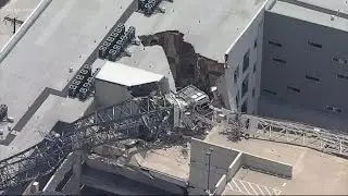 Construction crews start removal process of collapsed crane at Elan City Lights Apartments