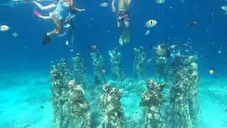 Underwater statue in gili meno