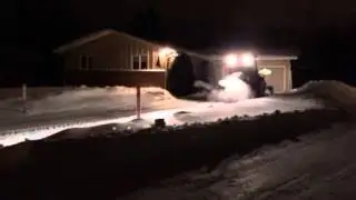 Fargo Snow using a Normand pull type snow blower FargoSnow.com