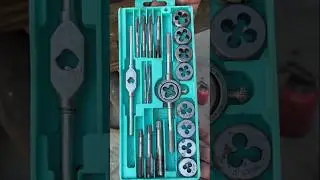 20-piece Metric Hand Tap and Die Set, typically used for creating and repairing screw threads
