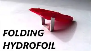 FIRST Cargo fighter boat for shallow water over folding hydrofoil wing PATENT PENDING not to scale