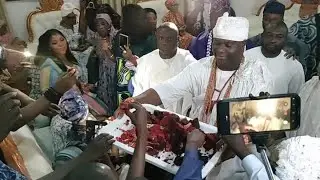 Moment Ooni Of Ife Shares His 49th Birthday Cake With His Wife And Loved Ones
