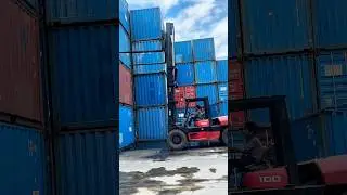 Forklift Handling Two Containers at Once