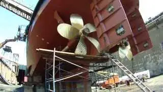 Lucy Reinauer and RTC 83 (underneath) while in graving dock