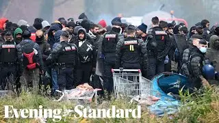 French police break up migrant camp near Dunkirk