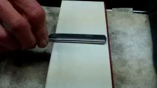 straight razor sharpening using circles on naniwa 12000 grit whet stone