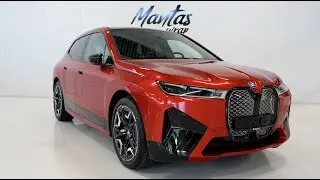 Оклейка BMW iX50 виниловой пленкой цвета &laquo;Ruby Red&raquo; от PWF / PlatinumWrappingFilm / Helfoliering / Car Wrap