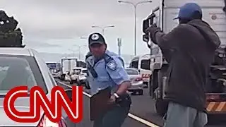 Cop shot point blank in the back