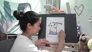 Coloring page of a goat playing on a swing.