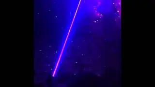 200W violet laser pointer in the dark