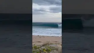 Pro surfer on west cost of Oahu