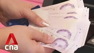 Long queues at banks as people withdraw new notes for CNY