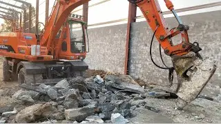 Hydraulic Breaker Working On Concrete Slabs 
