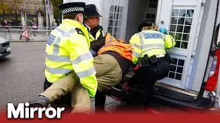 Police clash with Just Stop Oil protesters outside parliament