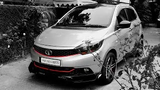 Tata tiago modified with 15 inches alloys and monster spoiler and side skirtings