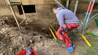 Grundleitungen im Altbau anschließen: 2 Kernbohrungen durch 90cm starke Sandsteinwand, 202mm Bohrung
