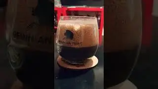 Make Your Own Beer.  how the treacle Imperial Stout is going. very wise to have such a small glass