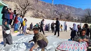 Snowy mountain path; Asghar reached school and Halima endured the snow