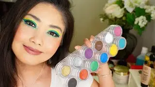 Green makeup look using Grimas water makeup