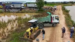 More dump truck Start New Project Delete Pit Field by Small Dozer Pour Soil Dirt