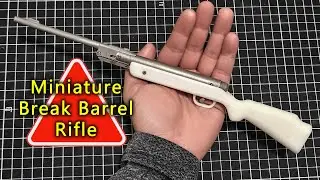 Miniature gun break-barrel rifle