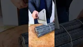 Metal rod challenge: attempting to cut through bundle of steel rods with large cleaver - strength