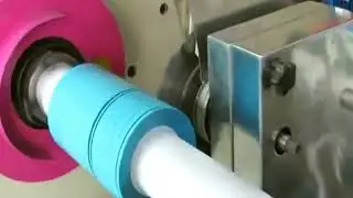 Adhesive tape slitting machine