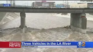 Multiple Cars Get Submerged By Fast-Flowing Los Angeles River