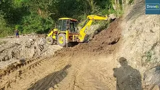 JCB ecoXcellence Backhoe Loader-Blocked Hilly Road-Clearing Road
