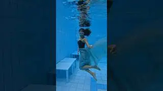 Girl in dress makes back flip underwater  💦💦