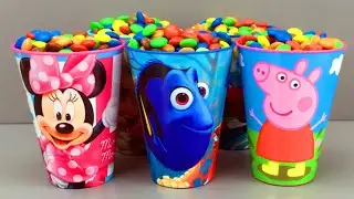 Candy Surprise Toys inside of cups full of M&M's Superhero