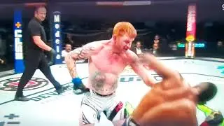 Ed Herman eats an insane left hand.