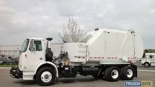 1998 Volvo WX64 Heil Rapid Rail Automated Side Loader for sale by Truck Site