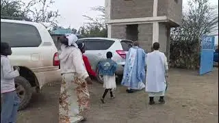 Catholic Priest blessing A home compond 