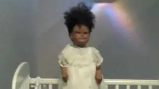 creepy doll at the denver art museum.