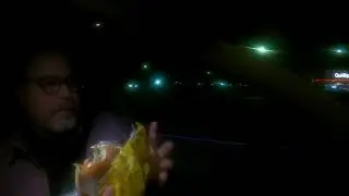 Eating Whataburger Monterey Melt Sandwich, 83rd Avenue & I-10, Phoenix, Arizona, NGH13263