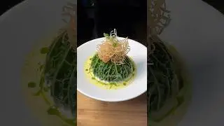 Steamed Prawn Wrapped Savoy Cabbage with cream and herb oil sauce