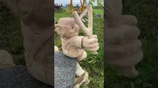 Carving Troll with slingshot