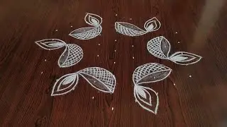 Sankarthi chukkala muggulu // Beautiful deepam kolam with amazing peacocks only 9*5 dot's