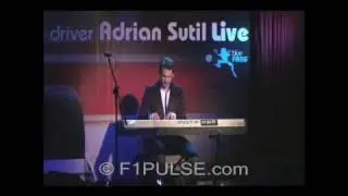 Adrian Sutil playing the keyboard